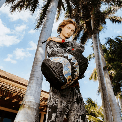 Black Quilted Irridescent DLXSV Backpack