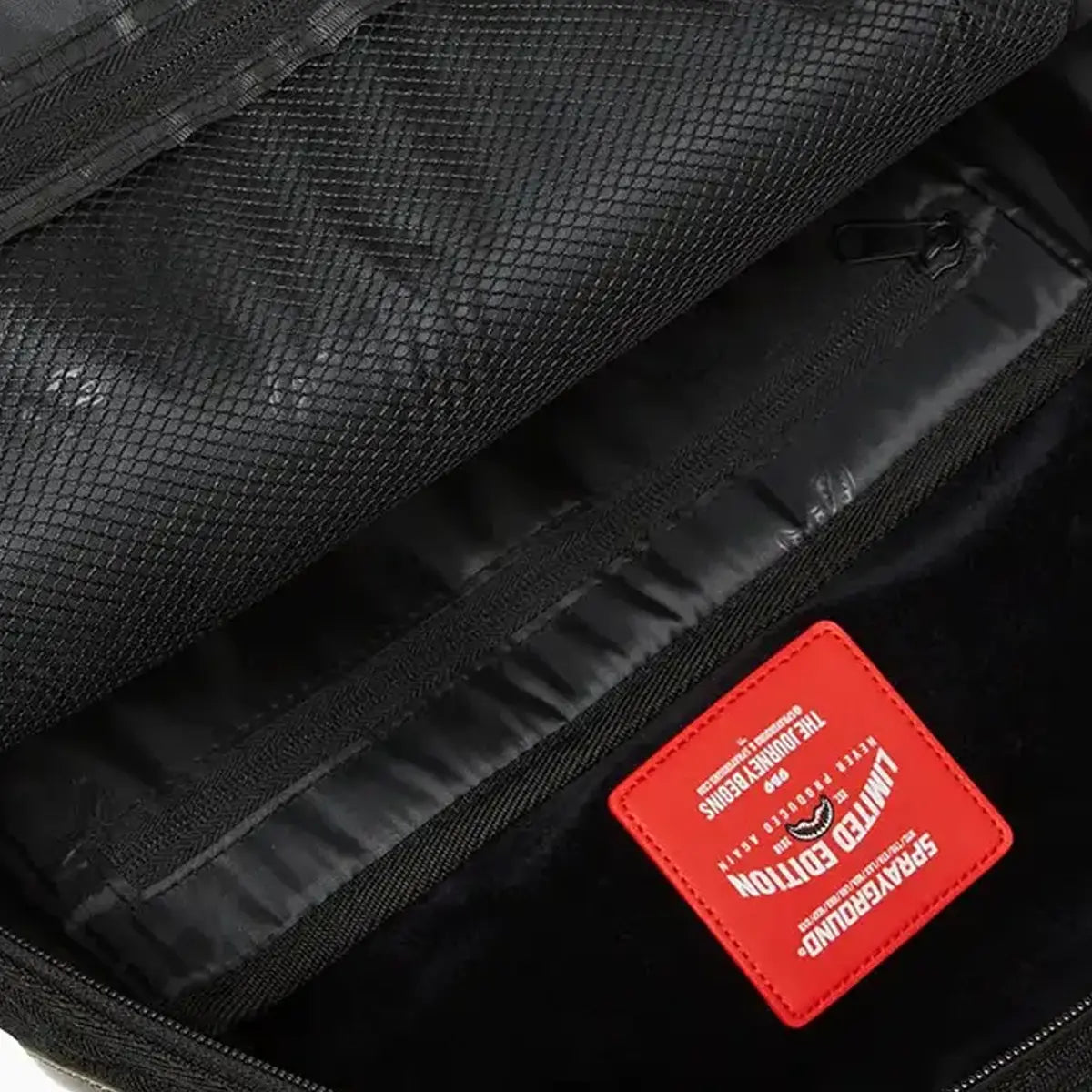 Black Quilted Irridescent DLXSV Backpack